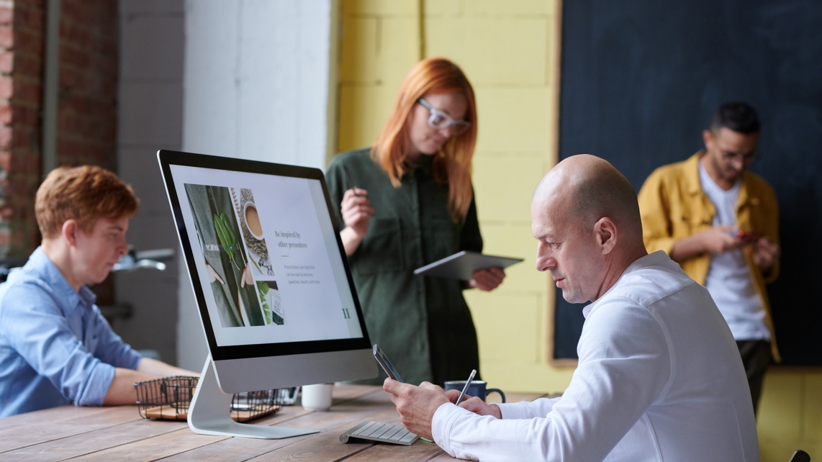 photo-of-man-sitting-in-front-of-computer-3184655