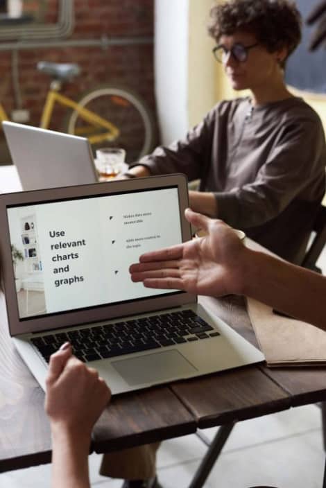 photo-of-laptop-on-top-of-wooden-table-3184166-1-scaled